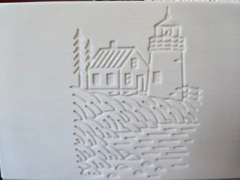 Side showing a light house at Acadia