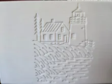 Side showing a light house at Acadia